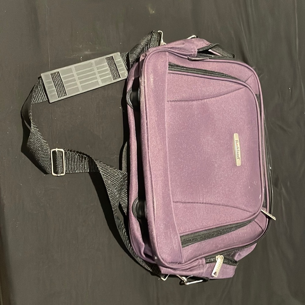 purple and black computer bag